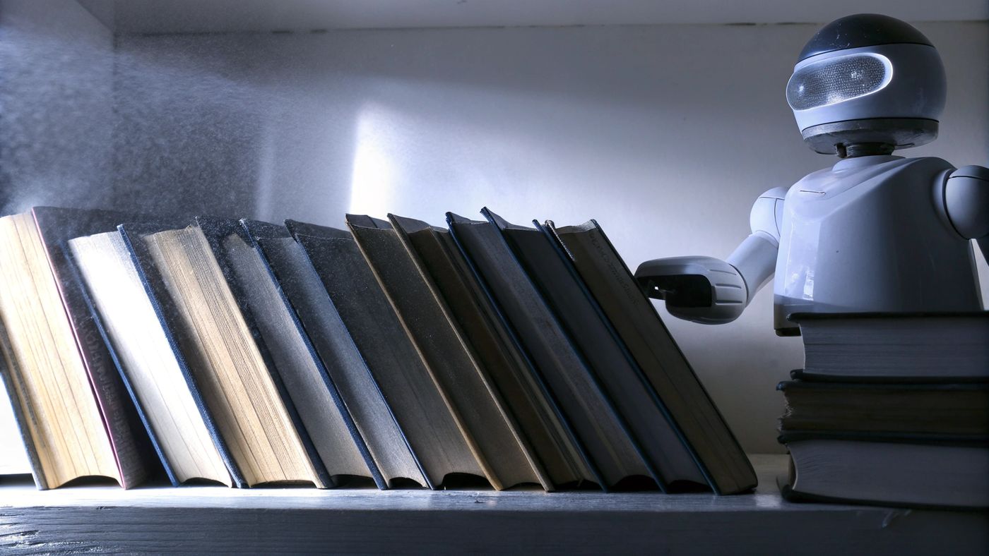 A shiny robot casually rewrites dusty academic books.
